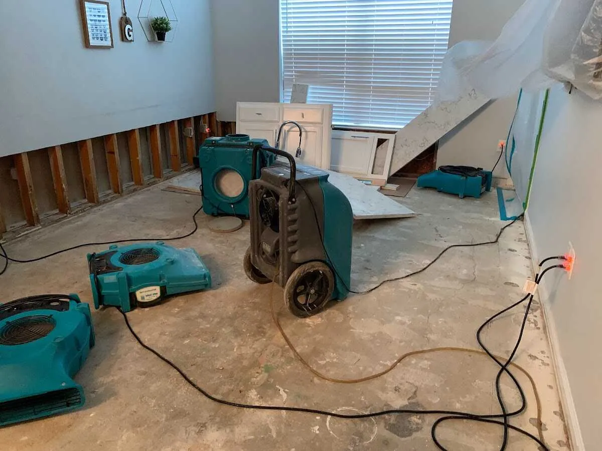 Dehumidifier in flood-cut room for Water Damage Restoration in Hannibal